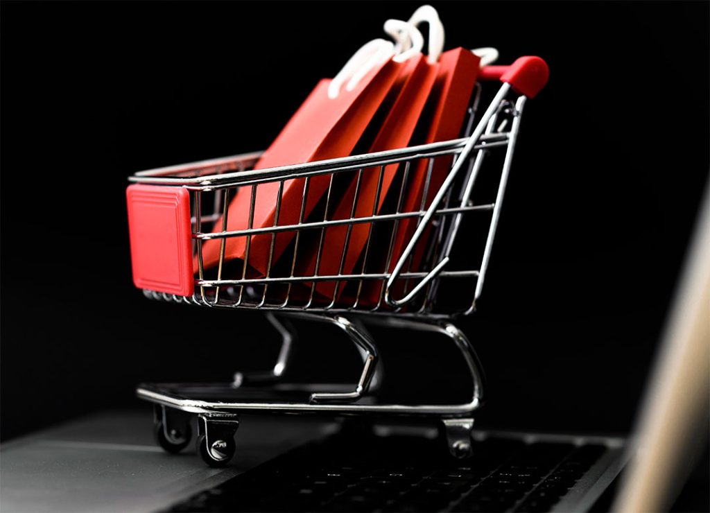 Front view cyber monday shopping cart with bags 1024x740